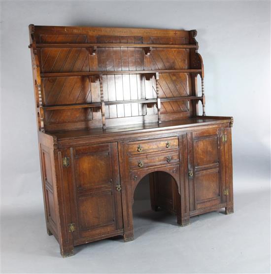 A Victorian Gothic revival red walnut sideboard, in the manner of Charles Locke Eastlake, W.5ft 7.25in.